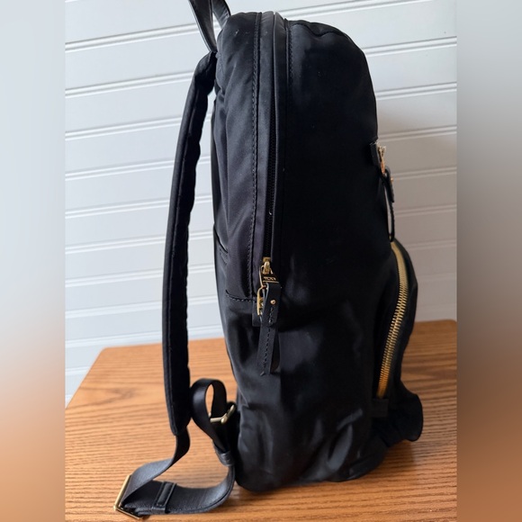 TUMI Black and Gold Backpack